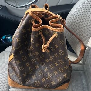 Louis Vuitton Brown and Tan Bucket drawstring Monogram Bag.